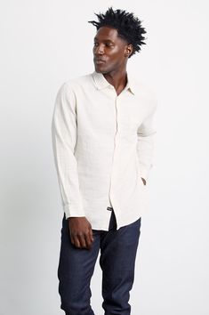 DETAILS | Lightweight cotton, long sleeve, neutral hummus beige buttondown shirt featuring relaxed fit and patch pocket at chest. Super soft, breathable cotton fabric mixed with a relaxed body shape makes the Wyatt the perfect Southern California inspired buttondown. 100% Cotton. Imported. CARE | Machine Wash Cold. Tumble Dry Low. Remove Promptly. Do Not Bleach. FIT | Recommend ordering true to size. Body Length: 30 3/4" (Measured from Large) Coral Blue, Mixing Fabrics, Body Shape, Modern Man, Classic Shirt, Tumble Dryer, Southern California, Chest Pocket, Fashion Games