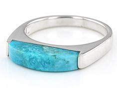 Freeform Cabochon Composite Turquoise Rhodium Over Sterling Silver Band Ring. Measures Approximately 0.75"L x 0.15"W. Not sizeable. This product contains composite turquoise. This means separate pieces of turquoise were bound together. Modern Polished Turquoise Jewelry, Modern Turquoise Jewelry With Polished Finish, Modern Round Turquoise Jewelry, Modern Turquoise Round Jewelry, Modern Oval Turquoise Jewelry, Modern Turquoise Oval Jewelry, Modern Turquoise Ring With Polished Finish, Modern Blue Turquoise Gemstone Ring, Modern Turquoise Round Ring