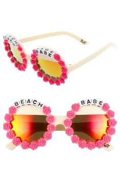 Free shipping and returns on Rad + Refined Beach Babe Round Sunglasses at Nordstrom.com. Mirrored lenses the color of a vibrant sunset glint from the center of these oversized round sunnies with pink flower details and playful letter beads. Adjustable Round Frame Sunglasses For Beach, Playful Summer Vacation Sunglasses, Playful Summer Sunglasses For Vacation, Trendy Round Frame Sunglasses For Beach, Trendy Round Frame Sunglasses For The Beach, Playful Beach Sunglasses For Spring, Playful Sunglasses For Beach In Spring, Fun Spring Festival Sunglasses, Spring Beach Sunglasses