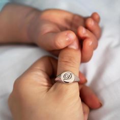 Make a statement with this unique Initial Signet Ring! This sleek and stylish ring is crafted from sterling silver and features your choice of an engraved initial. Let your signature be seen in a bold, beautiful way—add this timeless piece to your jewelry collection today! Sterling Silver Hypoallergenic, lead and nickel free Diameter 10mm Band Thickness 2mm #R010 Classic Everyday Initial Ring, Personalized Timeless Rings For Everyday, Classic Adjustable Initial Ring For Everyday, Timeless Personalized Rings, Everyday Timeless Sterling Silver Engraved Ring, Timeless Everyday Personalized Rings, Everyday Personalized Timeless Rings, Elegant Sterling Silver Initial Ring, Everyday Sterling Silver Signet Ring