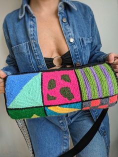 Save 20% when you shop directly on my website www.thejoyousbrand.com A one of a kind duffle bag you can take with you anywhere including the gym or your yoga class. It will make heads spin, promise! 🧶 Handmade with fabric and decorated with yarn using a punch needle. Approximate dimensions: L34 x W15 x H15 cm.  Adjustable strap. 🍃 For a better lifespan, spot clean by hand using a soft wet cloth, avoid rubbing. Do not machine wash. If yarn strands are accidentally pulled and protrude, simply cu Punch Needle Design, Shoulder Embroidery, Embroidery Bags, Bag Fabric, Handmade Fabric, Fabric Bag, Punch Needle, Bag Shoulder, Canvas Bag