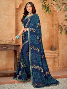 Aashna Chiffon Sequin Embroidered Designer Saree. SKU: 770572 Premium quality chiffon fabric Enhanced with sequin & resham embroidery work. Comes with unstitch blouse fabric High quality fabric and stitching. French Navy Blue, Reception Saree, Resham Embroidery, Embroidered Saree, Festive Wear, Georgette Fabric, Indian Festivals, Designer Saree, Party Wear Sarees