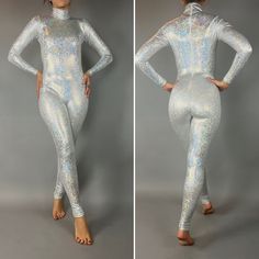 Hologram, broken Glass shiny catsuit. Turtleneck Back zipper Long sleeve High quality 4 way stretch lycra. Many colors available. Sleeveless and neckless versions available. Message me MANY COLORS AVAILABLE! Customize your catsuit! Pick your color fabric and send me a message with picture of fabric you like for this suit. Select your size using this basic scale XSmall: Fits women -men 85-105 lbs (and 54 tall and under) Small: Fits women- men 105 to 130 lbs Medium: Fits women - men 130 to 175 lbs Metallic Stretch Bodysuit For Club, Metallic High Stretch Unitard For Party, Long Sleeve Dance Bodysuit With Thumbholes, Long Sleeve Bodysuit With Thumbholes For Dance, High-stretch Rave Bodysuit For Parties, Metallic Shiny High Stretch Unitard, White Stretch Unitard For Party, Stretch White Unitard For Parties, Silver Shiny Stretch Bodysuit