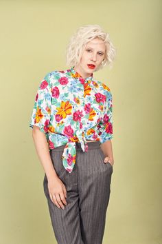 "Darling floral top with short sleeves, slouchy shape, small pointy collar, buttons from the neck down, one breast pocket and soft cotton fabric. ➽ brand: Take Away ➽ material: cotton rayon blend ➽ condition: great! ➽ model stats: 34\" 25\" 35\" 5'10 ➽ size: medium ➽ measures: waist 39\" / pit to pit 40\" / bust 40\" / length 26 1/2\" ➽ Apple Branches Vintage applebranchesvintage.etsy.com instagram.com/applebranchesvtg" Plum Pants, Brown Pleated Skirt, Vintage Floral Blouse, Pointy Collar, Teal Blouse, Black Lace Shorts, Gold Shirt, Vintage Short, Applique Dress