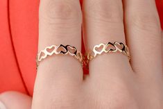 Our heart band ring is 14k solid gold, and it's available in gold and rose gold. It is a half eternity band that is consist of open hearts. If you consider this open heart ring as a gift for birthdays, valentine's day, mother's day, anniversaries, or graduation, it makes happy your loved ones. 🎁 If you want, you can add a gift note for your loved ones. It arrives in a special jewelry gift box. ✨ We respond to your questions happily. Your question will be answered within 24 hours. Do not hesitat Open Heart Ring, Heart Band, Heart To Heart, Gold Ring Designs, Gold Designs, Solid Gold Ring, Half Eternity Band, Ring Minimalist, Solid Gold Rings