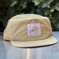 Ento Outdoor Western Saddler Hat Beige Flat Brim Hat For Outdoor, Beige Short Brim Hat For Outdoor Activities, Beige Snapback Hat For Outdoor, Adjustable Beige Snapback Hat For Outdoor, Beige Snapback Hat With Flat Bill For Outdoor, Casual Lightweight Flat Bill Hat, Lightweight Khaki Hat With Curved Brim, Khaki Flat Brim Hat For Travel, Beige 5-panel Hats For Spring