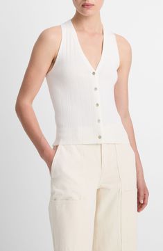 Designed to wear by itself, this ribbed cotton sweater-vest shows off your shoulders—and a bit more if you go with an unbuttoned look. 23" length (size medium) Front button closure V-neck Cutaway shoulders 100% cotton Hand wash, dry flat Imported Classic Ribbed Tank Top For Spring, Classic Ribbed Knit Top For Spring, Spring Knit Sweater Vest With Button Closure, Knit Sweater Vest With Button Closure For Spring, Spring Ribbed Cotton Sweater Vest, Spring Cotton Ribbed Sweater Vest, Classic Spring Tank Top With Button Closure, Classic Fitted Sweater Vest For Summer, Fitted Sweater Vest With Button Closure For Spring