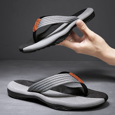 The sturdy yet flexible sole ensures stability and durability. Whether you're lounging at home or stepping out for a casual outing, these slippers offer a cozy and versatile option for your feet. Mens Flip Flops Fashion, Mens Thong Sandals, Cruise Attire, Men Flip Flops, Comfortable Flip Flops, Men Slippers, Slippers For Men, Sandals For Men, Soft Design