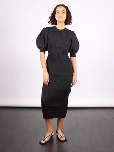 Fluted Short Puff Sleeve Dress in Black by CFCL-Idlewild Ribbed Knit Sweater Dress For Evening, Evening Ribbed Knit Sweater Dress, Short Puff Sleeve Dress, Short Puff Sleeve, Puff Sleeve Dress, Pleats Please Issey Miyake, Mother Denim, Malene Birger, Puffed Sleeves Dress