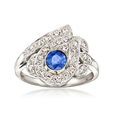 Ross-Simons - C. 1950 Vintage .57ct Sapphire, .55ct t. w. Diamond Ring Round Cut Size 8. C. 1950. Boasting Retro-era style and charm, this Estate collection ring adds panache to your day-to-day dress with a .57 carat round sapphire centered on a unique 55 ct. t. w. round diamond design. Finely crafted in polished 14kt white gold. 5/8" wide. Diamond and sapphire ring. Exclusive, one-of-a-kind Estate Jewelry. Diamond And Sapphire Ring, Jewelry Presentation, Antique Jewelry Rings, Retro Era, 1950 Vintage, Round Sapphire, Vintage Sapphire, Fine Jewelery, Natural Blue Sapphire