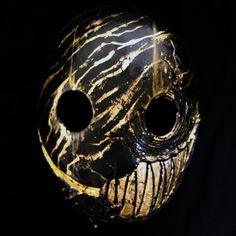 "This is a new version of one of my existing masks (https://www.etsy.com/listing/544551045/smile-version-2-resin-cast-mask ) This is resin cast mask with imitation gold leafe inlay. It's light weight and secures in palace with elastic Note: -Uses imitation gold leafe, but 18K yellow gold, and 12K white gold are available upon request at an added cost. -Made to order item -Marblizing and gold inlay will be replicated as closely as possible but 100% identical is not possible. -Custom paint is free Creepy Masks, Halo 4, Scary Mask, Idee Cosplay, Costume Masks, Smile Design, Norfolk Va, Cool Masks, Marble And Gold