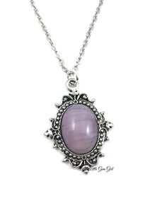 This necklace is exquisite! The focal point of this necklace is the glass cabochon which has been made in the style of an quartz in light purple amethyst (made from glass not a gemstone). Each stone is handmade which means no two stones will be alike. 13x18mm Cabochon is set securely in a lovely vintage Victorian style necklace. Pendant Setting - 22w x 29h Material - zinc alloy (casting) in Antique Silver finish Chain - 18 inch or 24 inch link chain with lobster clasp CARE INSTRUCTIONS: : Water Amulet Charm, Light Amethyst, Photo Necklace, Glass Light, February Birthstone, Amethyst Quartz, Wedding Jewellery Necklace, Vintage Victorian, February Birth Stone