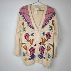 Vintage Deadstock Needles & Yarn Cream Floral Knit Cardigan Sweater, Size Small. Tunic Length. Ramie/Acrylic Vintage Deadstock - New With Tags Please Note That There Is Some Discoloration From Normal Aging; See All Photos For Reference. Vintage V-neck Knit Cardigan, One Size Pink Cardigan For Fall, Pink Long Sleeve Retro Cardigan, Vintage Knit V-neck Cardigan, Vintage Pink Cardigan For Spring, Retro Knit Outerwear For Spring, Retro Knitted Spring Sweater, Vintage Pink Knit Cardigan, Retro Knitted Sweater For Spring