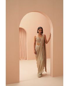 Glamorous Draped Set For Reception, Glamorous Traditional Drape Dress For Diwali, Glamorous Draped Sets With Unstitched Blouse, Elegant Fitted Pre-draped Saree With Mirror Work, Glamorous Draped Wedding Set, Elegant Side Open Georgette Choli, Glamorous Draped Georgette Choli, Glamorous Draped Lehenga With Sheer Dupatta, Festive Elegant Side-open Choli