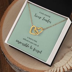 Show an Amazing Girl Scout Troop Leader your appreciation with this beautiful linked hearts necklace. This Girl Scout Leader Gift has the phrase "A truly amazing Troop Leader is hard to find, difficult to part with, and impossible to forget." Give as a gift at the end of a scouting year, for a leader's retirement, or if she's moving on from the troop.♡ AT A GLANCE:- The necklace is made out of high quality polished surgical steel, with a rose gold finish or 18k yellow gold finish over stainless Girl Scout Troop Leader, Troop Leader, Girl Scout Leader, Scout Leader, Girl Scout Troop, Hearts Necklace, White Gift Boxes, Luxury Boxes, Girl Scout