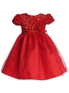 Your little girl will light up the room in this exquisite Lito velvet sequin adorned glitter tulle flower girl dress. Handcrafted in the U.S.A. with a stylish sequined bodice and glitter tulle skirt, this luxurious design is sure to make your special day extra memorable. This dress is available in a range of captivating colors, allowing you to choose the perfect shade to complement your event's theme. This dress is impeccably suited for the festive ambiance of the Christmas season.