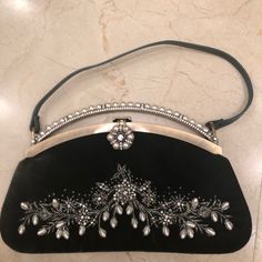 100% Authentic Luxury Pouch Shoulder Bag With Pearl Handle, Event Handheld Shoulder Bag With Removable Pouch, Luxury Top Handle Shoulder Bag For Events, Designer Top Handle Shoulder Bag For Events, Evening Shoulder Bag With Top Carry Handle, Luxury Evening Bag With Handles For Events, Elegant Evening Tote Bag, Designer Shoulder Bag With Detachable Handle For Events, Evening Pouch Bag With Handles