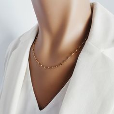 "Cylinder Bar Gold Chain Necklace in 14k Gold Filled - Gold Jewelry Gifts for her - Delicate, classic and elegant necklace for you, mom, bff Chain width: 1.8mm Bar Link length: 5mm Material: 14k Gold Filled Clasp: Spring Ring About \"Gold Filled Jewelry\": Also called rolled-gold. These jewelry items are not actually filled with gold. They are made of a base metal covered by sheets of gold in a mechanical bonding process. Effectively a thick coat of gold: the industry standard for the gold conte Gold Jewelry Gift, Thick Coat, Elegant Necklace, Elegant Necklaces, Gold Chain Necklace, Gold Filled Jewelry, Base Metal, Spring Rings, Gold Chain