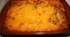 a casserole dish sitting on top of a stove