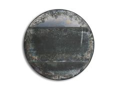 an old metal plate with rusted paint on the edges and bottom, against a white background