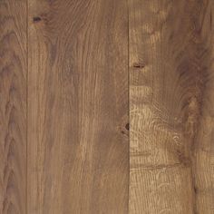 a close up view of the wood grains on this wooden flooring board, with an interesting pattern