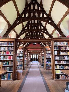 the inside of a large library with lots of books