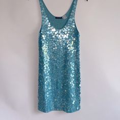 New Never Worn In Perfect Condition Light Blue Sequined Mini Dress For Summer, Blue Sequined Mini Dress For Summer, Turquoise Mini Dress For Summer Party, Light Blue Sleeveless Sequin Mini Dress, Light Blue Sleeveless Mini Dress With Sequins, Sleeveless Light Blue Mini Dress With Sequins, Blue Sequined Beach Dress, Blue Sequin Beach Dress, Turquoise Sleeveless Mini Dress For Spring