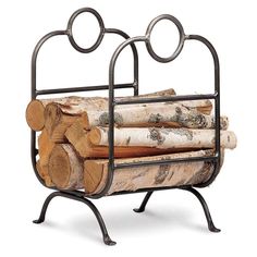 a metal rack with logs stacked on top of each other in front of a white background