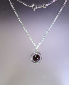 "This simple yet lovely necklace features a lovely 8mm Gemstone (pick your stone) on a beautiful 16, 17\" or 18\" sterling silver chain with a sterling silver clasp. Comes boxed and ready for gift giving. Available in Garnet (January), Bloodstone (March), Amethyst (February), Aquamarine (March), Green Aventurine, Black Onyx, Faceted Black Tourmaline, and Pyrite. Other stones are available - contact me for availability and pricing" Bloodstone Necklace, Lovely Necklace, Black Tourmaline, Necklace Sterling Silver, Birthstone Necklace, Green Aventurine, Sterling Silver Chain, Sterling Silver Necklace, Glass Jewelry