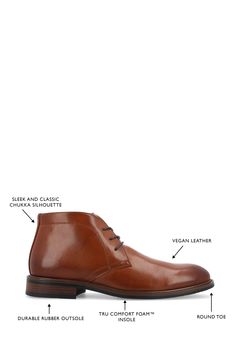 Elevate your work-to-weekend look in this refined faux-leather chukka boot featuring tonal stitch construction, breathable lining and a Tru Comfort Foam insole. Synthetic upper/textile lining/rubber sole Imported Brown Chukka Boots For Fall Workwear, Casual Cognac Boots For Work, Brown Ankle Chukka Boots For Work, Fall Chukka Boots With Brogue Detailing For Work, Business Chukka Boots With Leather Footbed For Fall, Brown Desert Boots For Work With Plain Toe, Plain Toe Chukka Boots For Business Casual In Fall, Fall Business Casual Chukka Boots With Plain Toe, Business Casual Chukka Boots With Plain Toe For Fall