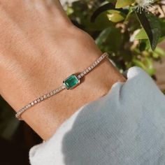 This Thanksgiving, elevate your gifting with our exquisite 4 Carat Diamond Tennis Bracelet, featuring a stunning lab-grown emerald center stone set in 14K solid gold. Crafted with lab-grown diamonds, this bracelet embodies elegance and sustainability, making it a perfect personalized gift for her. Its timeless charm and sophisticated design radiate luxury and make a heartfelt statement. Celebrate special moments with this stunning piece that captures the essence of love and gratitude. 𝐅𝐞𝐚𝐭𝐮 Luxury Emerald Tennis Bracelet As Gift, Luxury Emerald Tennis Bracelet Gift, Emerald Cut Emerald Bracelet As A Gift, Fine Jewelry Emerald Tennis Bracelet As Gift, Emerald Tennis Bracelet Fine Jewelry Gift, Elegant Emerald Tennis Bracelet Gift, Emerald Gemstone Tennis Bracelet, Gift, Beauty Features, Perfect Thanksgiving