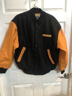 Perfect for your gaming fan!! Polyester parts of jacket have a wool feel. Arms are leather. Burks Bay Mens Yellow Leather Black Bomber Jacket PAC Man Black Orange Size M. Condition is Pre-owned. Shipped with USPS Priority Mail. A-6 coats Fancy Clothes, Orange Jacket, Man Black, Pac Man, Yellow Leather, Fancy Outfits, Black Orange, Priority Mail, Orange Black