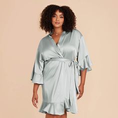 These gorgeous robes are equal parts ruffled romance and glamorous satin. Feminine Satin Party Sleepwear, Chic Satin Evening Sleepwear, Chic Satin Sleepwear For Evening, Fitted Satin Robe For Loungewear, Elegant Satin Dresses For Loungewear, Feminine Satin Robe For Loungewear, Elegant Satin Sleepwear For Spring, Chic Satin Robe For Wedding Night, Wedding Night Satin Dress With Ruffles