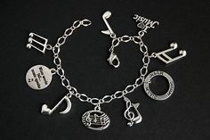 Music Bracelet. Music Charm Bracelet. Music Lover Bracelet. Musical Note Bracelet. Silver Bracelet. Handmade Jewelry. by GatheringCharms from Gathering Charms by Gilliauna. Find it now at https://ift.tt/1X7wBSe! Music Inspired Jewelry, Guys Jewelry, Lover Bracelet, Music Bracelet, Handmade Charm Bracelets, Lovers Bracelet, Silver Heart Bracelet, Silver Rings With Stones, Music Jewelry