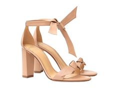 Alexandre Birman Clarita Block 90 Fabric - Women's Shoes : Nude : Make the most of your evening out in the Alexandre Birman Clarita Block 90 Fabric heel sandals. Slip-on, heeled sandals feature a lustrous suede leather upper with a sleek bow adorning the halo ankle strap. Open-toe silhouette. Slip-on styling. Wrapped bow detail adorns the vamp. Soft leather lining and lightly padded insole. Wrapped square heel. Leather outsole. Measurements: • Heel height: 3 1⁄2 in. Made in Brazil. Weight of foo Formal Ankle Tie Sandals With 4-inch Heel, Luxury Ankle Tie Sandals For Formal Occasions, Formal Sandals With 4-inch Heel And Ankle Tie, Formal Sandals With Heel Strap And Ankle Tie, Elegant Ankle Tie Heels With Heel Loop, Elegant Ankle Tie Sandals For Formal Occasions, Luxury Spring Heels With Bow, Luxury Bow Heels For Spring, Ankle Strap Sandals With Bow For Cocktail