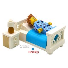 there is a lego bed with a lion on it