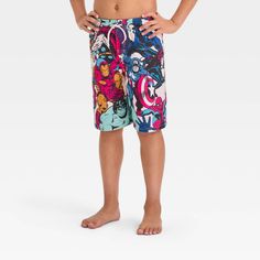 Bring some superhero style to their beachside looks with this Marvel Fictitious Character Swim Shorts. Made from a soft fabric and featuring a tagless design, these regular-rise swim shorts offer them comfortable wear in or out of water, while the UPF 50+ material helps keep their skin shielded from the sun. Plus, they're designed with a drawstring waistband for a secure and customizable fit. Featuring comic-style illustrations of the Hulk, Black Panther, Iron Man, Captain America, Black Widow a Cotton Swim Trunks With Built-in Shorts For Pool, Multicolor Bottoms With Built-in Shorts For Pool, Playful Cotton Swim Trunks For Pool, Fun Short Summer Swimwear, Playful Bottoms With Built-in Shorts For Pool, Playful Cotton Swim Trunks For Summer, Playful Swim Shorts For Pool, Cotton Moisture-wicking Shorts For Beach Season, Moisture-wicking Cotton Shorts For Beach Season