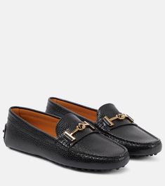 Gommino leather loafers in black - Tods | Mytheresa Calf Leather Slip-on Loafers For Galas, Luxury Leather Sole Slip-on Loafers, Luxury Slip-on Loafers With Leather Sole, Luxury Slip-on Loafers With Leather Lining, Slip-on Calf Leather Loafers For Galas, Calf Leather Slip-on Moccasins For Driving, Calf Leather Moccasins With Stitched Sole For Office, Office Moccasins With Stitched Sole In Calf Leather, Calf Leather Loafers With Textured Sole For Business