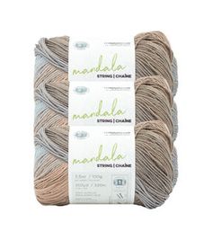 three skeins of yarn in light brown and beige colors, with the words nandal