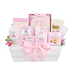 a pink gift basket filled with lots of goodies