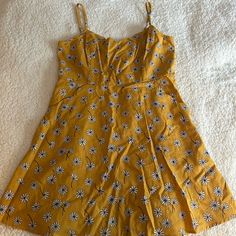 Nwt Sun Dress. No Issues, Too Big. Has Pockets And Adjustable Straps! Yellow Sundress With Sunflower Print For Summer, Yellow Daisy Print Summer Dress, Casual Mustard Mini Dress With Floral Print, Mustard Floral Print Mini Dress, Casual Yellow Sunflower Print Dress, Mustard Floral Mini Dress, Yellow Sleeveless Dress With Sunflower Print, Yellow Sleeveless Sunflower Print Dress, Casual Mustard Mini Dress For Spring