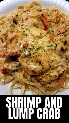 shrimp and lump crab pasta on a white plate with the words shrimp and lump crab over it