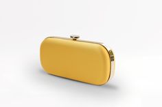 The Limoncello Yellow Bella Clutch is a bold yellow bridal handbag, crafted with duchess satin by Italian artisans featuring a lively pop of color. Planning a maximalist wedding day or looking to make a powerful statement at your next gala? Inspired by Italy’s Amalfi Coast, a coastline featuring terraced vineyards and cliffside lemon groves, this luxury handbag will make a statement on your wedding day, at a red-carpet affair, or on a tropical destination trip. First seen on celebrity stylist Mi Chic Yellow Clutch For Gift, Chic Yellow Clutch As Gift, Chic Yellow Clutch As A Gift, Chic Yellow Clutch For Formal Occasions, Elegant Yellow Bags For Formal Occasions, Elegant Yellow Bag For Formal Occasions, Elegant Yellow Formal Bags, Elegant Yellow Formal Bag, Chic Yellow Rectangular Clutch