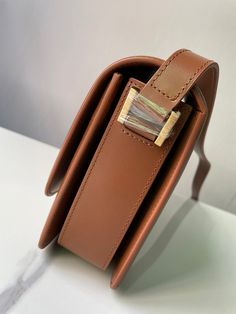 Size: 23cm*16cm*6cm It comes with Dust box, Care manual, Tag, and Paper bag. High-end Brown Flap Bag For Everyday, Modern Rectangular Saddle Bag, High-end Brown Crossbody Box Bag, High-end Brown Flap Shoulder Bag, High-end Brown Shoulder Bag As Gift, High-end Brown Shoulder Bag For Gift, High-end Brown Shoulder Flap Bag, High-end Brown Rectangular Case Bag, Luxury Brown Rectangular Saddle Bag