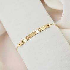 "Coordinate bracelet in 14kt gold filled, rose gold filled or sterling silver. Choose a location that means the most to you! We can also engrave the back with initials or a short saying, just include it in your notes when you check out. This little bar bracelet is engraved with the location of your choice with a Longitude and Latitude . Won't fade, chip or discolor. Wear it all day, everyday! We never take ours off! :) Makes a great gift for bridesmaids, family, friends or a bride-to-be! DETAILS Rose Gold Name Bracelet With Jubilee Detail For Everyday, Dainty Engraved Bracelets For Everyday Wear, Dainty Engraved Bracelets For Everyday, Dainty Engraved Bracelet For Everyday Wear, Dainty Everyday Engraved Bracelets, Engraved Rose Gold Sterling Silver Name Bracelet, 14k Gold Nameplate Bracelet For Everyday, Everyday 14k Gold Nameplate Bracelet, Personalized Minimalist Gold Bracelet For Everyday