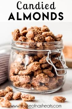 a glass jar filled with candied almonds