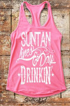 "Suntan Lines & Day Drinkin' Tank Top - Sunshine, Long Days and Ice Cold Drinks, Favorite Time of Year. Life is Good. We have your summer time Tank tops -60% Combed Ring-Spun Cotton 40% Polyester -30 single for extreme softness -Pre-shrunk for reduced shrinkage -Finished edge Available in Small thru XL If in questions about sizing we recommend measuring one of your shirts lying flat, seam to seam, you normally wear and then purchasing the size that is closest to those measurements on the siz Sleeveless Summer Holiday Tops, Sleeveless Tops For Summer Holiday, Summer Holiday Graphic Print Tops, Graphic Print Summer Holiday Tops, Graphic Print Tops For Summer Holiday, Holiday Sleeveless Cotton Top, Fun Beach Season Holiday Tops, Fun Holiday Beach Tops, Summer Holiday Shirt With Graphic Print