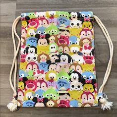 Cute Bag For The Tsum Tsum Fan! Never Used Multicolor Character Print Bags For Daily Use, Playful Multicolor Bags With Character Print, Playful Character Print Multicolor Bag, Playful Multicolor Character Print Bags, Fun Multicolor Bag With Character Print, Playful Bags With Character Print For Everyday Use, Playful Character Print Bags For Everyday Use, Playful Everyday Bags With Character Print, Casual Bags With Character Print For Daily Use