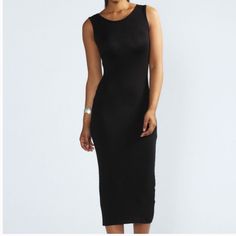 Boohoo Lindsey Sleeveless Midi Dress Black Size Us 10 What To Wear' Dilemmas Will Be A Thing Of The Past With This Sleeveless Midi Dress In Your Closet. Styled With A Round Neck And Slim Fit And Cut To Sit At The Calf, It Literally Works For Any Occasion. For Day, Simply Slip On With Your Low-Tops And When Nighttime Arrives, Swap In Your Stilettos And You'll Be Vibing, Babe. Style: Bodycon Dress Design: Plain Fabric: Jersey Length: Midi Neckline: Crew Sleeve Length: Sleeveless New With Tags ***S Sleeveless Stretch Black Midi Dress, Black Stretch Sleeveless Midi Dress, Black Sleeveless Stretch Maxi Dress, Black Bodycon Midi Sleeveless Dress, Black Bodycon Sleeveless Midi Dress, Black Sleeveless Midi Dress For Night Out, Black Sleeveless Maxi Dress For Date Night, Style Bodycon Dress, Beautiful Midi Dresses