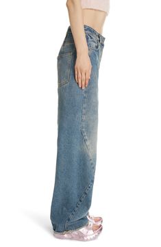 Raw hems and a faded, vintage-inspired wash lend a had-'em-forever vibe to these wide-leg jeans crafted in a seam-detailed pieced design from nonstretch denim. 34" inseam; 23" leg opening; 11 1/4" front rise; 16" back rise (size 28) Zip fly with button closure Front scoop pockets; back patch pockets 100% cotton Dry clean or machine wash, line dry Made in Italy Designer Clothing Jean Crafts, Fit Inspo, Fitness Inspo, Medium Blue, Wide Leg Jeans, Givenchy, Leg Jeans, Designer Clothing, Vintage Inspired